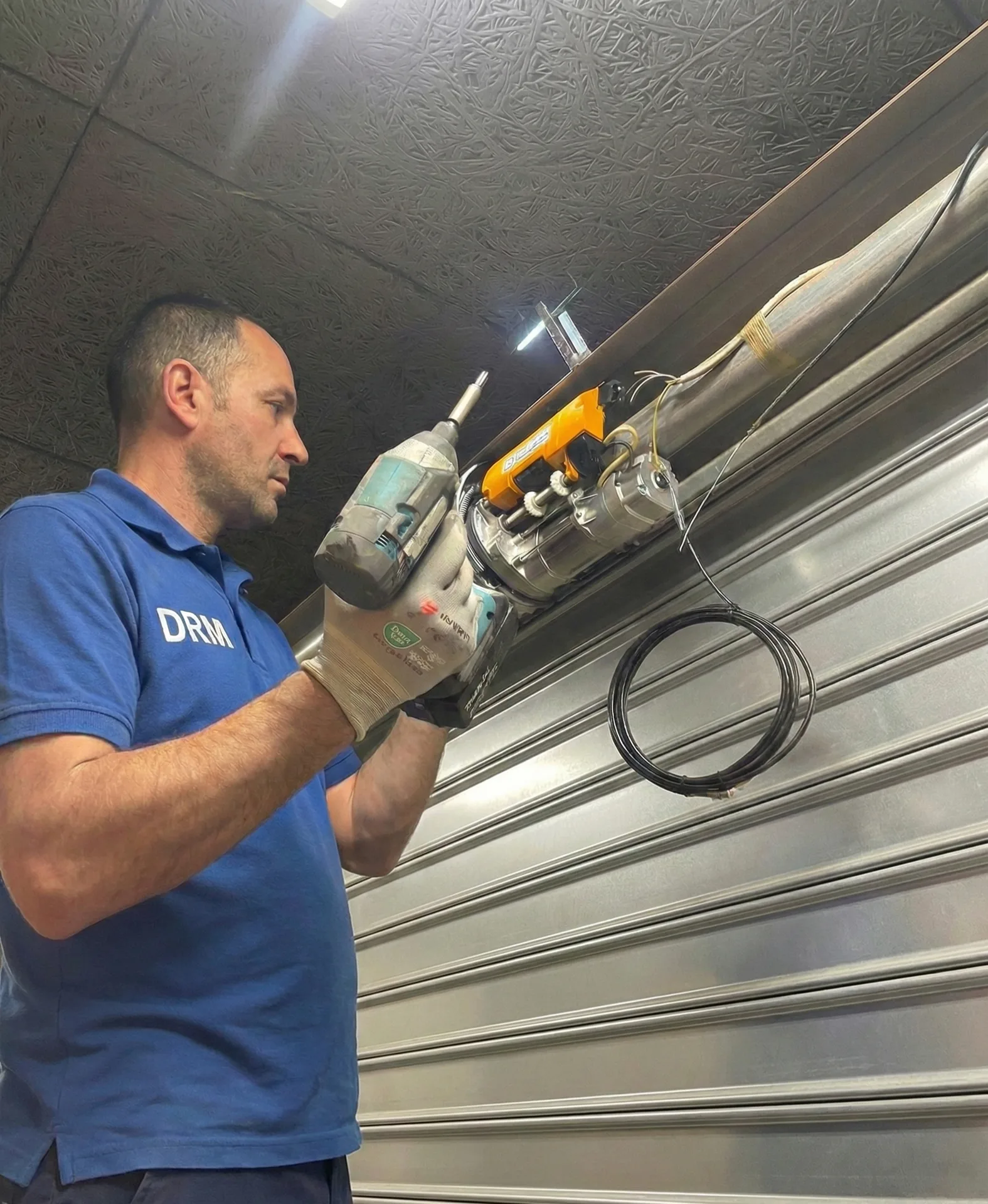 Motorisation rideau metallique sur-mesure Grossoeuvre